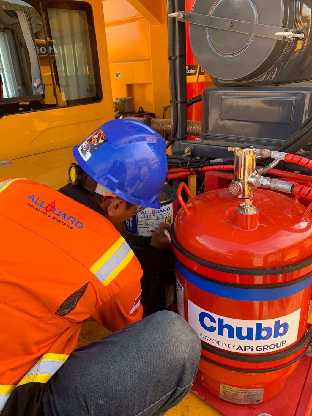 Allguard technician commissioning a Chubb vehicle fire suppression system on site